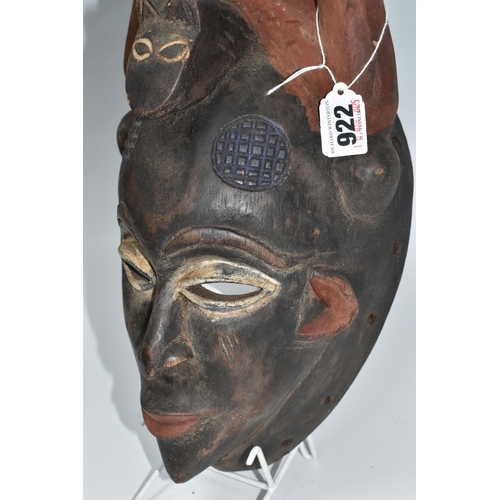 922 - A PUNE TRIBAL MASK, GABON with naturally pigmented horns with an anthropomorphic crest to the forehe... 