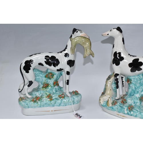 924 - A PAIR OF STAFFORDSHIRE 'DISRAELI CURL' GREYHOUND FIGURES comprising a left and right facing hound, ... 