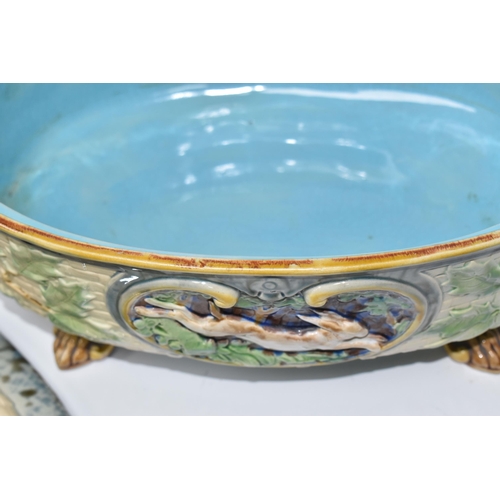 925 - A MINTON MAJOLICA LIDDED GAME PIE TUREEN with a moulded gundog handle to the lid, with two twisted h... 