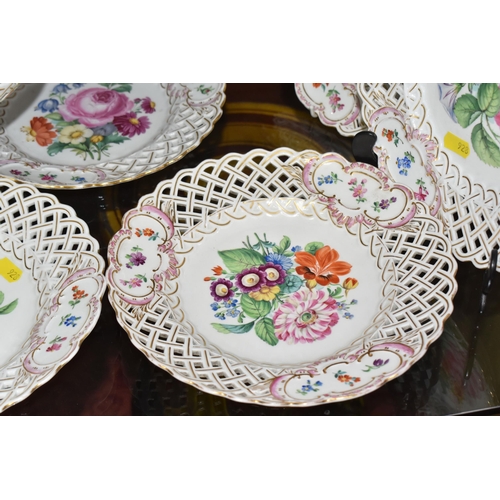 928 - AN EIGHT PIECE MEISSEN FLORAL AND GILT DESSERT SET comprising two pedestal bowls with central floral... 