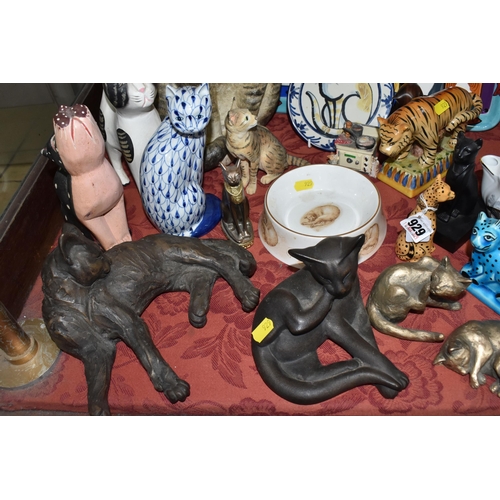 929 - A COLLECTION OF CAT ORNAMENTS to include a Staffordshire tiger, a British Museum replica blue cat, t... 