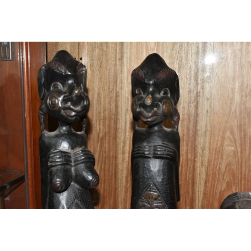 932 - A GROUP OF MOSTLY MID TWENTIETH CENTURY WEST AFRICAN WOODEN SCULPTURES comprising a pair of two knee... 