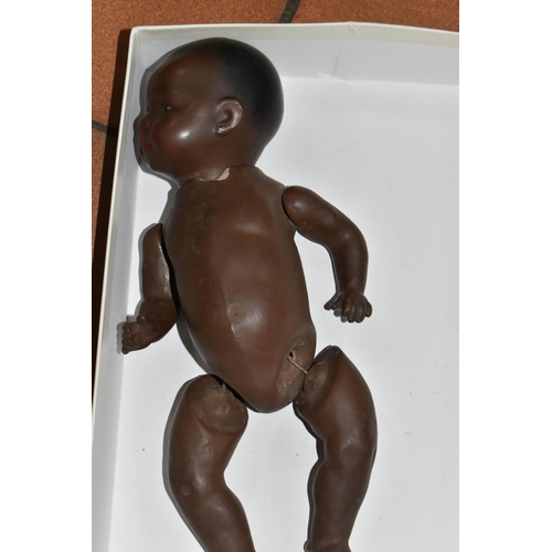 934 - A HEUBACH KOPPELSDORF BABY DOLL, number 399, black skin, red painted lips and hair and sleeping eyes... 