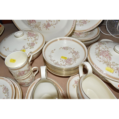 938 - A COLLECTION OF ROYAL DOULTON DINNER WARE, pattern no. D5334 'Minden', comprising four oval meat pla... 