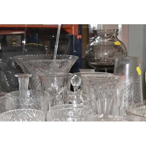 939 - A COLLECTION OF CUT GLASS AND ETCHED GLASSWARE, to include decanters, grapefruit dishes, large punch... 