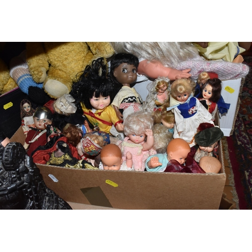 942 - FOUR BOXES AND ONE SUITCASE OF DOLLS, BOOKS AND SEWING MACHINE to include a collection of 'Tiny Tear... 