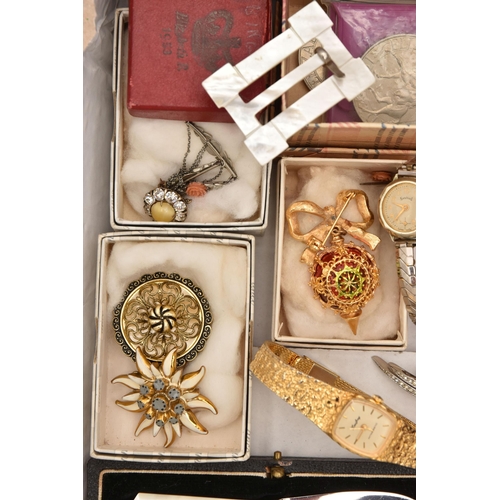 556 - A BOX OF ASSORTED ITEMS, to include a shrapnel fragment with a rose metal cartouche and bail, engrav... 