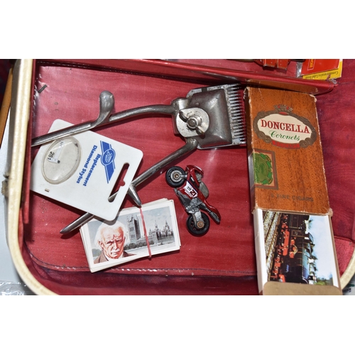 756 - A VINTAGE CASE OF MISCELLANEOUS ITEMS to include assorted stamps, a plated royal commemorative napki... 