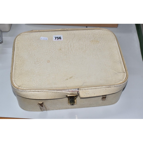 756 - A VINTAGE CASE OF MISCELLANEOUS ITEMS to include assorted stamps, a plated royal commemorative napki... 