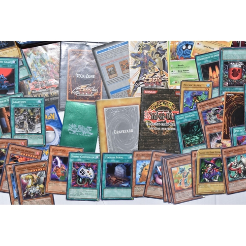 758 - A TIN OF OVER THREE HUNDRED YU-GI-OH CARDS, includes first editions, rares, ultra rares and secret r... 