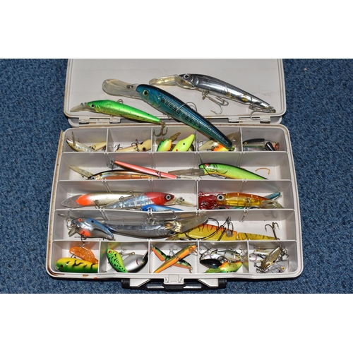 768 - A BOX OF ASSORTED FISHING LURES, to include jerkbait and poppers, all with barbed hooks, brands to i... 