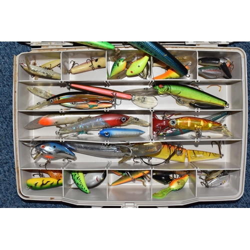 768 - A BOX OF ASSORTED FISHING LURES, to include jerkbait and poppers, all with barbed hooks, brands to i... 