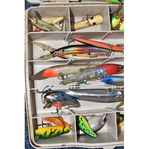 768 - A BOX OF ASSORTED FISHING LURES, to include jerkbait and poppers, all with barbed hooks, brands to i... 