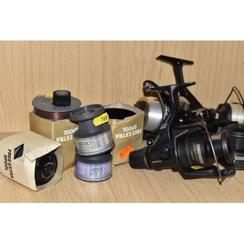 769 - A GROUP OF FISHING REELS, to include a Fox Santos 3200FD reel (as new with tag attached), a Shimano ... 