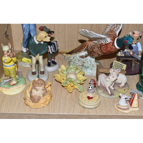 784 - A COLLECTION OF ANIMAL FIGURES, CERAMICS AND GLASS, to include a Victorian glass dump weight, height... 