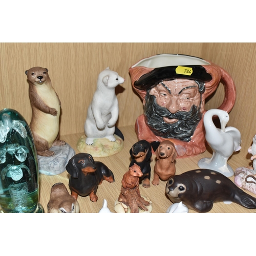 784 - A COLLECTION OF ANIMAL FIGURES, CERAMICS AND GLASS, to include a Victorian glass dump weight, height... 