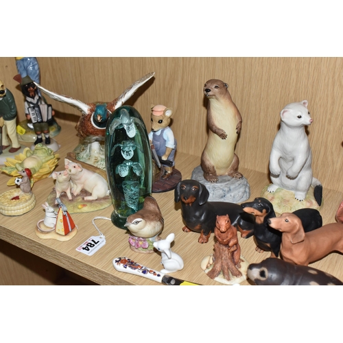 784 - A COLLECTION OF ANIMAL FIGURES, CERAMICS AND GLASS, to include a Victorian glass dump weight, height... 