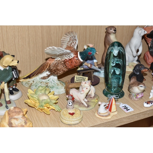 784 - A COLLECTION OF ANIMAL FIGURES, CERAMICS AND GLASS, to include a Victorian glass dump weight, height... 