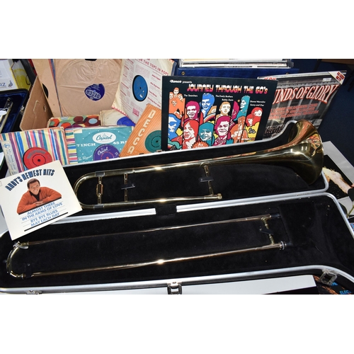 794 - A CASED TROMBONE, A BOX AND A CASE OF RECORDS, to include an Elkhart Industries Blessing Scholastic ... 