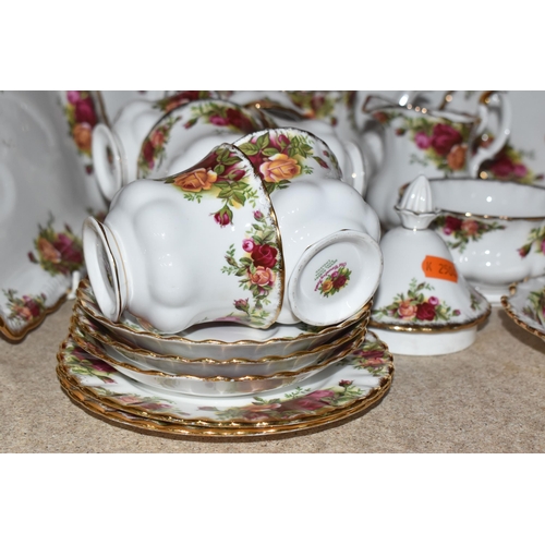 815 - A ROYAL ALBERT 'OLD COUNTRY ROSES' TEA AND PARTIAL DINNER SET to include two cake plates, a rectangu... 