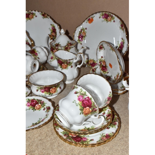 815 - A ROYAL ALBERT 'OLD COUNTRY ROSES' TEA AND PARTIAL DINNER SET to include two cake plates, a rectangu... 