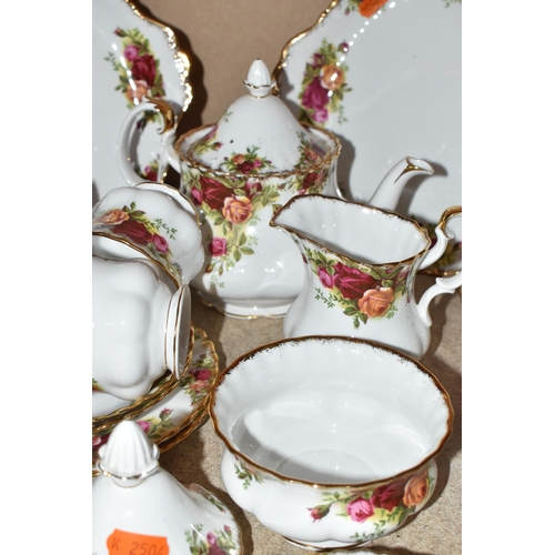 815 - A ROYAL ALBERT 'OLD COUNTRY ROSES' TEA AND PARTIAL DINNER SET to include two cake plates, a rectangu... 