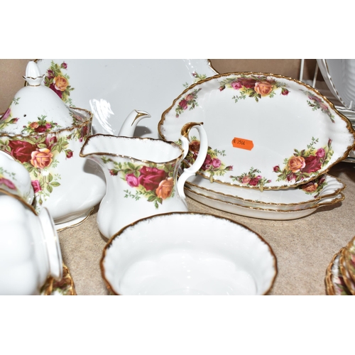 815 - A ROYAL ALBERT 'OLD COUNTRY ROSES' TEA AND PARTIAL DINNER SET to include two cake plates, a rectangu... 