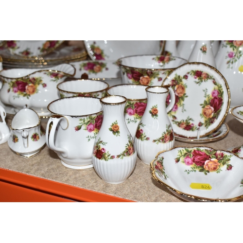 824 - A LARGE COLLECTION OF ROYAL ALBERT 'OLD COUNTRY ROSES' TEA, COFFEE, AND DINNER WARES to include a sa... 