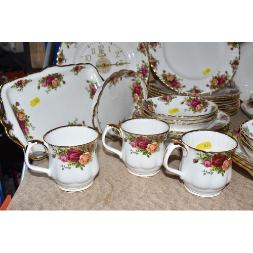 824 - A LARGE COLLECTION OF ROYAL ALBERT 'OLD COUNTRY ROSES' TEA, COFFEE, AND DINNER WARES to include a sa... 