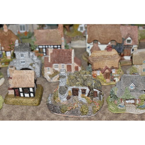 853 - A COLLECTION OF LILLIPUT LANE COTTAGES, comprising boxed cottages: The Crooked House, The Cuddy, Man... 