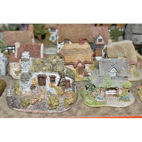 853 - A COLLECTION OF LILLIPUT LANE COTTAGES, comprising boxed cottages: The Crooked House, The Cuddy, Man... 