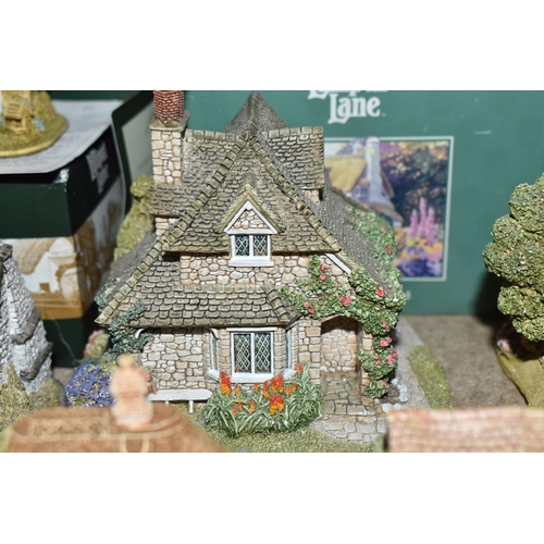 853 - A COLLECTION OF LILLIPUT LANE COTTAGES, comprising boxed cottages: The Crooked House, The Cuddy, Man... 