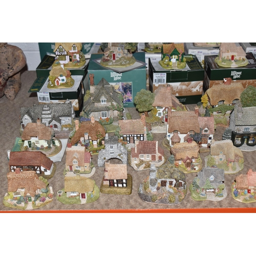 853 - A COLLECTION OF LILLIPUT LANE COTTAGES, comprising boxed cottages: The Crooked House, The Cuddy, Man... 