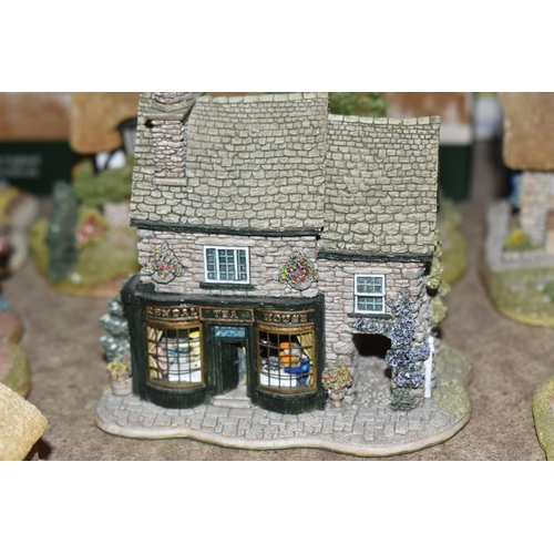 853 - A COLLECTION OF LILLIPUT LANE COTTAGES, comprising boxed cottages: The Crooked House, The Cuddy, Man... 