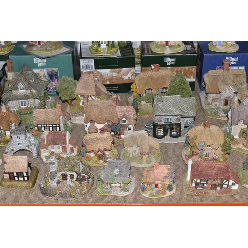 853 - A COLLECTION OF LILLIPUT LANE COTTAGES, comprising boxed cottages: The Crooked House, The Cuddy, Man... 