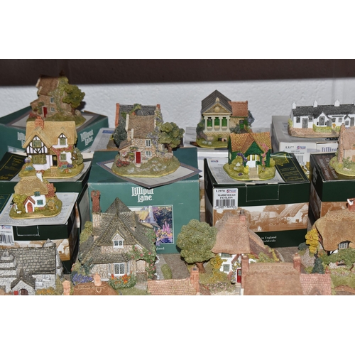 853 - A COLLECTION OF LILLIPUT LANE COTTAGES, comprising boxed cottages: The Crooked House, The Cuddy, Man... 