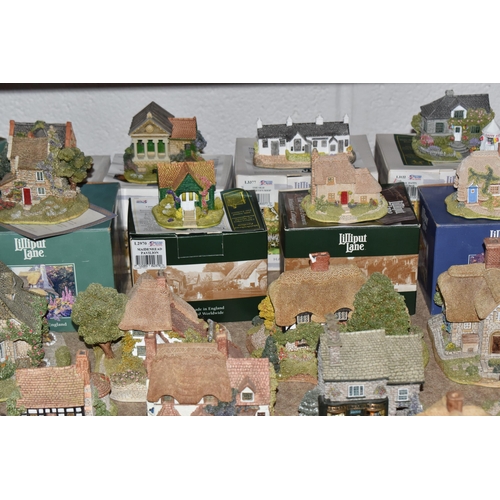 853 - A COLLECTION OF LILLIPUT LANE COTTAGES, comprising boxed cottages: The Crooked House, The Cuddy, Man... 