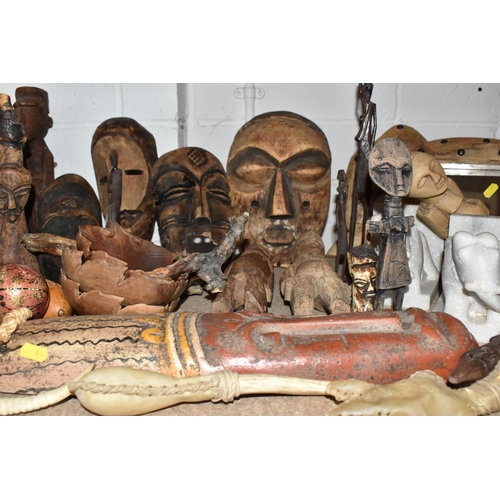 870 - A GROUP OF DECORATIVE AFRICAN SCULPTURES, comprising a selection of masks, animal sculptures, figure... 