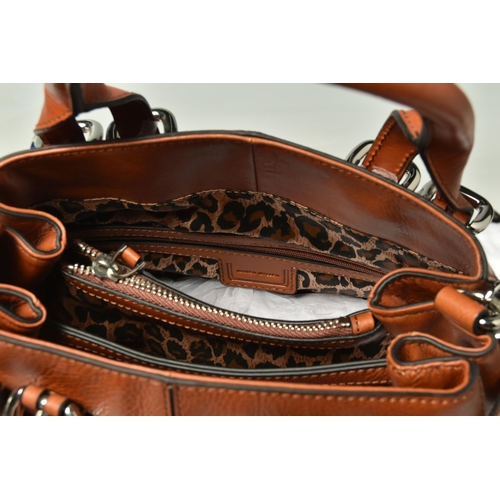 586 - KAREN MILLEN: TWO LEATHER HANDBAGS: a tan leather handbag with removable shoulder strap, silver tone... 
