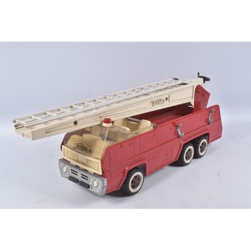 54 - THREE TONKA TOYS AERIAL LADDER FIRE TRUCKS, all ladders raise lower and turn, one with working damag... 