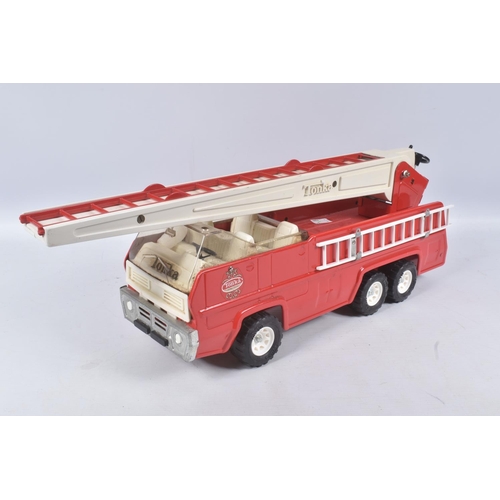 54 - THREE TONKA TOYS AERIAL LADDER FIRE TRUCKS, all ladders raise lower and turn, one with working damag... 