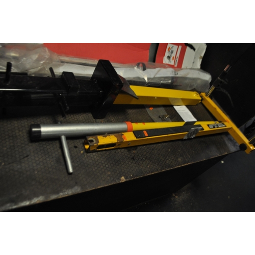 66 - A SELECTION OF VEHICLE SECURITY AND CARRYING EQUIPMENT including a Erde motorcycle trailer skid (no ... 