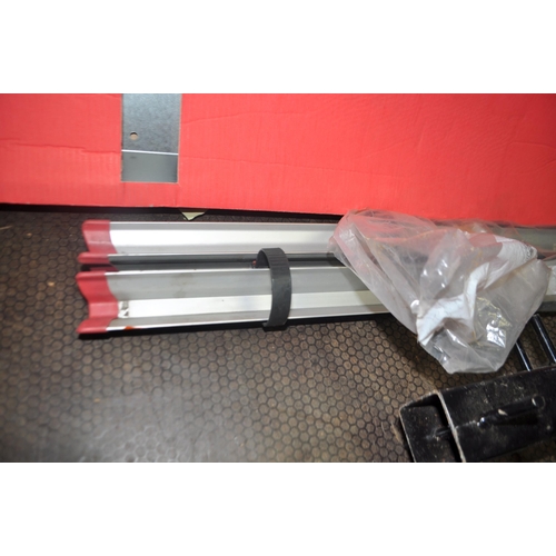 66 - A SELECTION OF VEHICLE SECURITY AND CARRYING EQUIPMENT including a Erde motorcycle trailer skid (no ... 