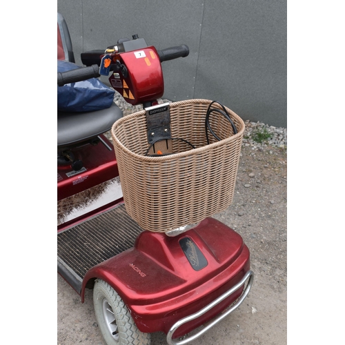 7 - A SHOPRIDER MOBILITY SCOOTER, condition report: one key, charger and PAT pass and working, battery i... 