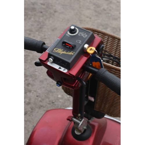 7 - A SHOPRIDER MOBILITY SCOOTER, condition report: one key, charger and PAT pass and working, battery i... 