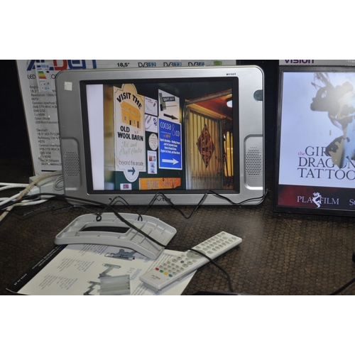 75 - AN AVTEX 15in CARAVAN TV WITH POWER SUPPLY AND REMOTE, a Bauhn TV/DVD combi with power supply and re... 