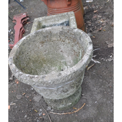 27 - TWO GARDEN PLANTERS, including an early 20th Century reconstituted stone two piece urn, 36cm high, a... 