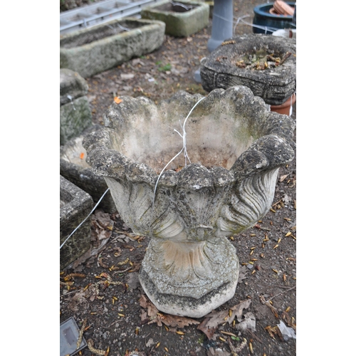 38 - A MODERN CONCRETE GARDEN URN, constructed in two pieces with acanthus leaf detail to bowl