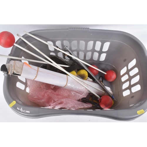 174 - SIX TRAYS CONTAINING RC HELICOPTER PARTS including nose cones, tail rods, rotors, engine parts, manu...