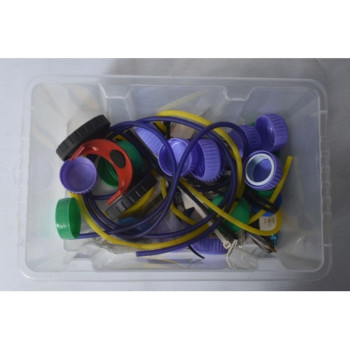 174 - SIX TRAYS CONTAINING RC HELICOPTER PARTS including nose cones, tail rods, rotors, engine parts, manu...